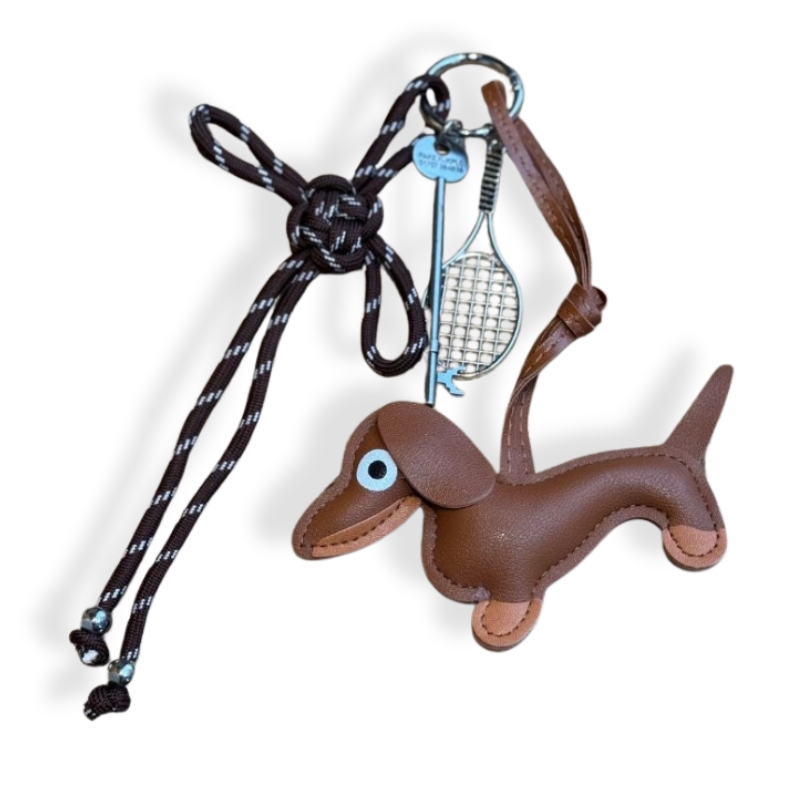 Bijou de sac chien clef badminton Auren